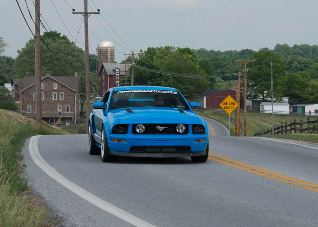2006 GT Mustang Cruising Down a Back Road